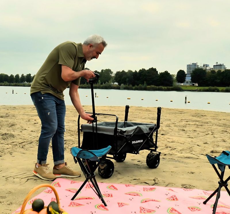 Doldurcar katlanabilir taşıma arabası, siyah model, sahilde geniş tekerlekli